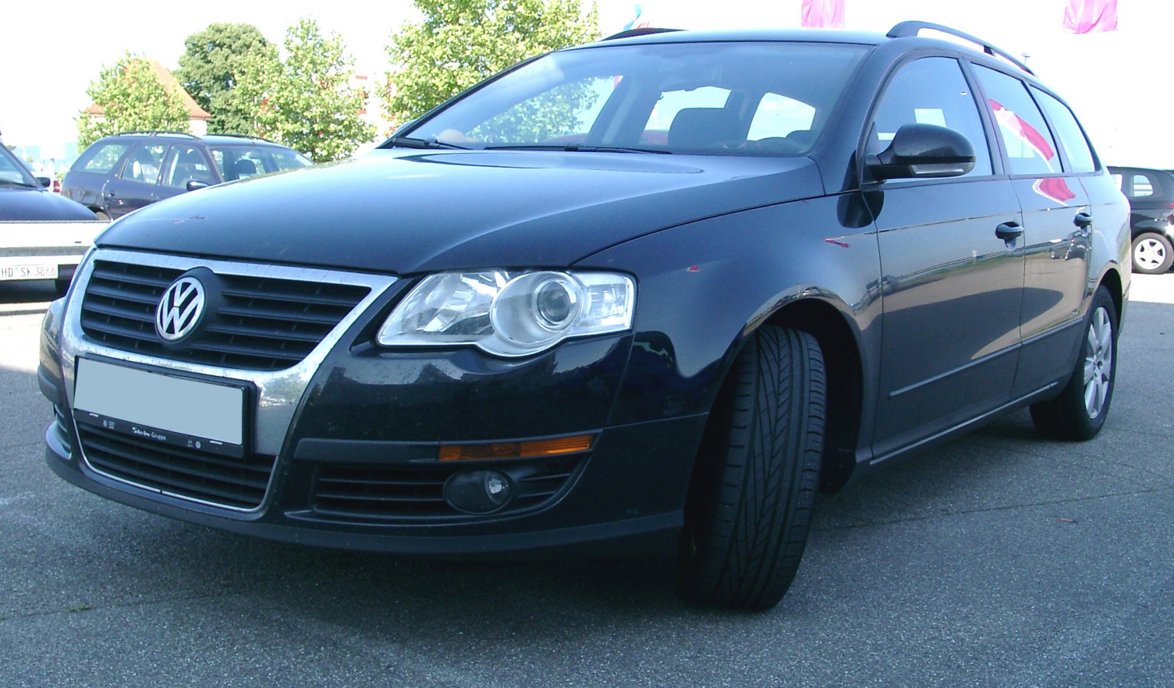 Front and side view of estate car with distinctive grille and headlights