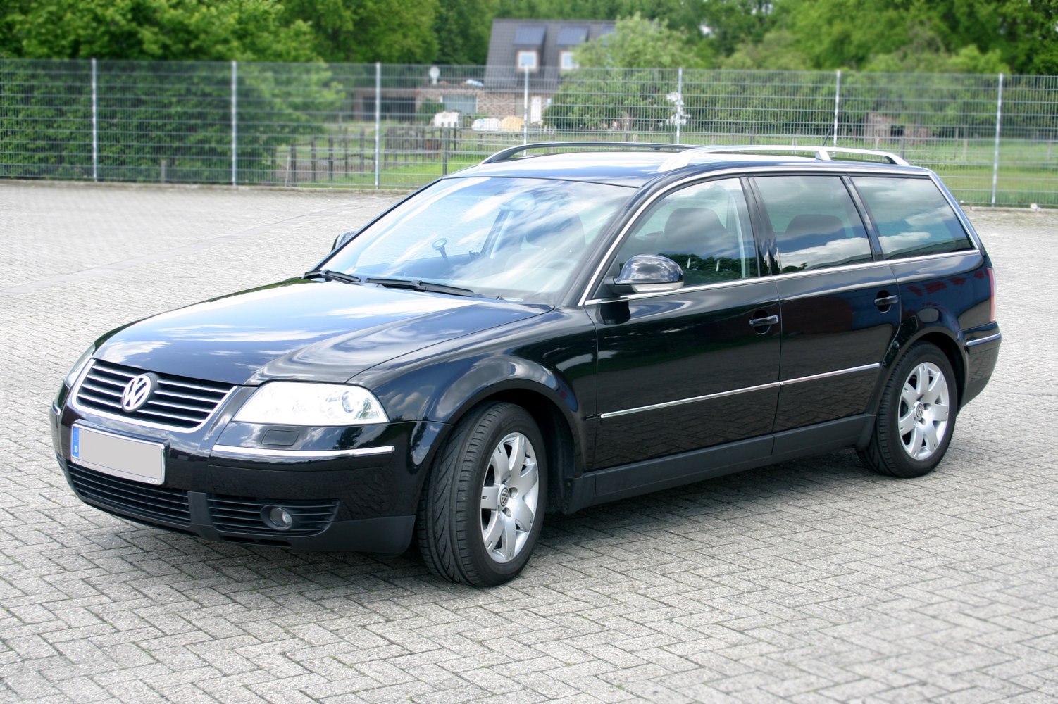 Front side view of sleek station wagon with alloy wheels
