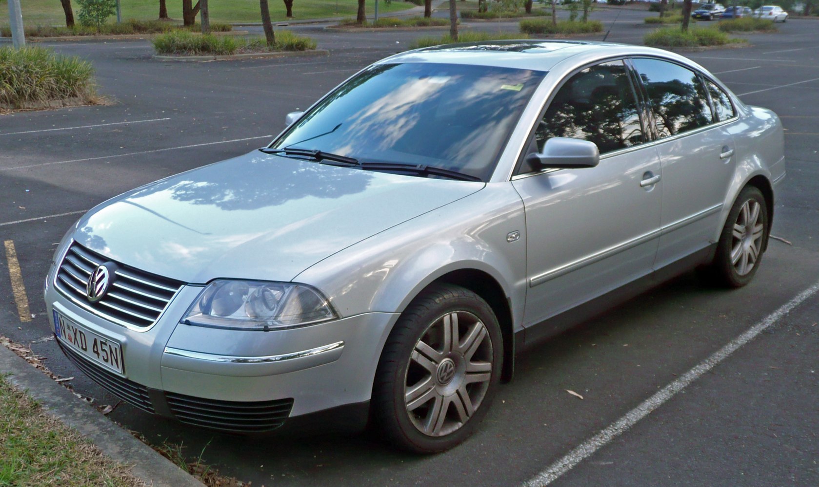 Silver sedan with front side view, alloy wheels