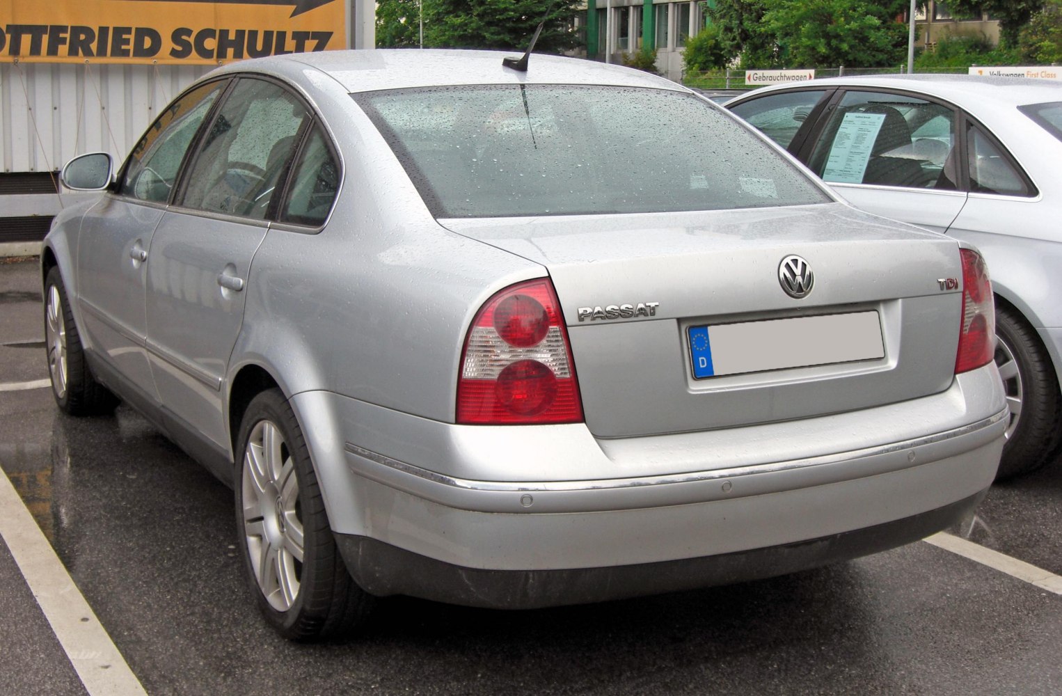 Silver sedan rear view with TDI badge and rounded taillights