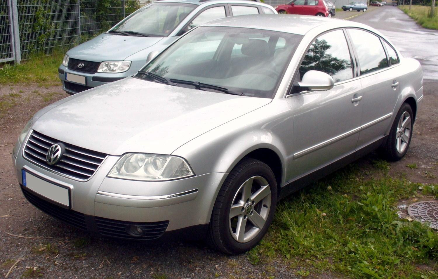 Silver sedan front 3-4 view with chrome grille and alloy wheels