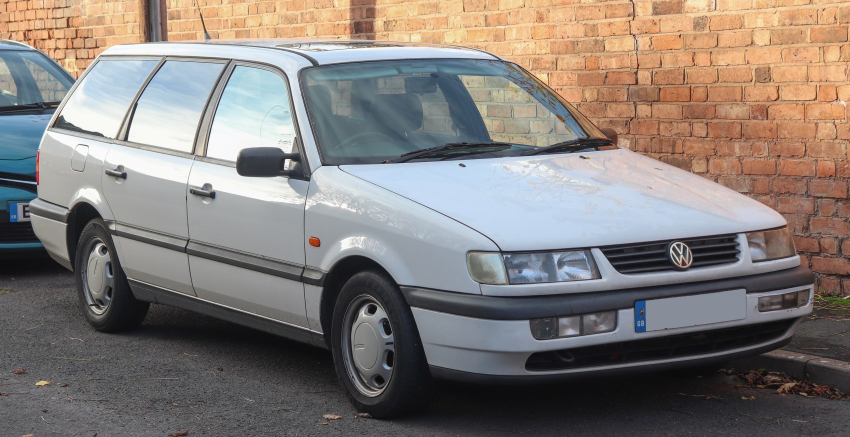 Front-side view of 1990s station wagon with rectangular headlights