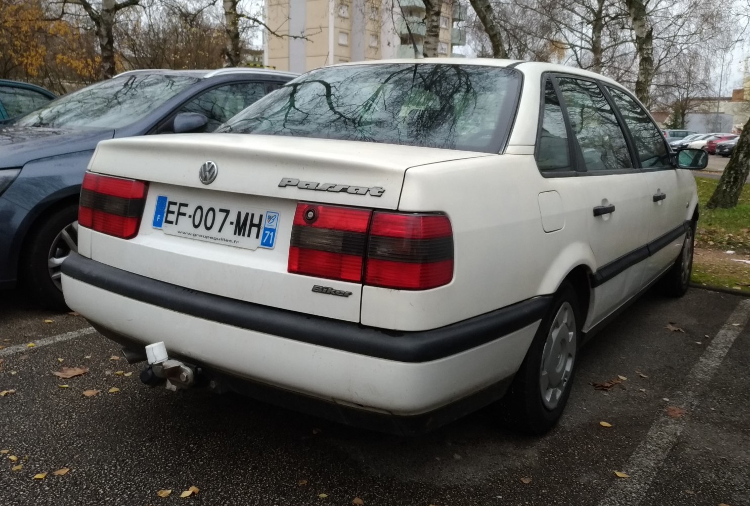 Rear view with distinctive taillights and tow hitch on a hatchback vehicle.
