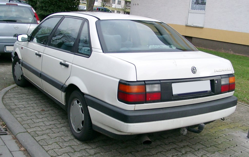 Rear side view with taillights and classic sedan design