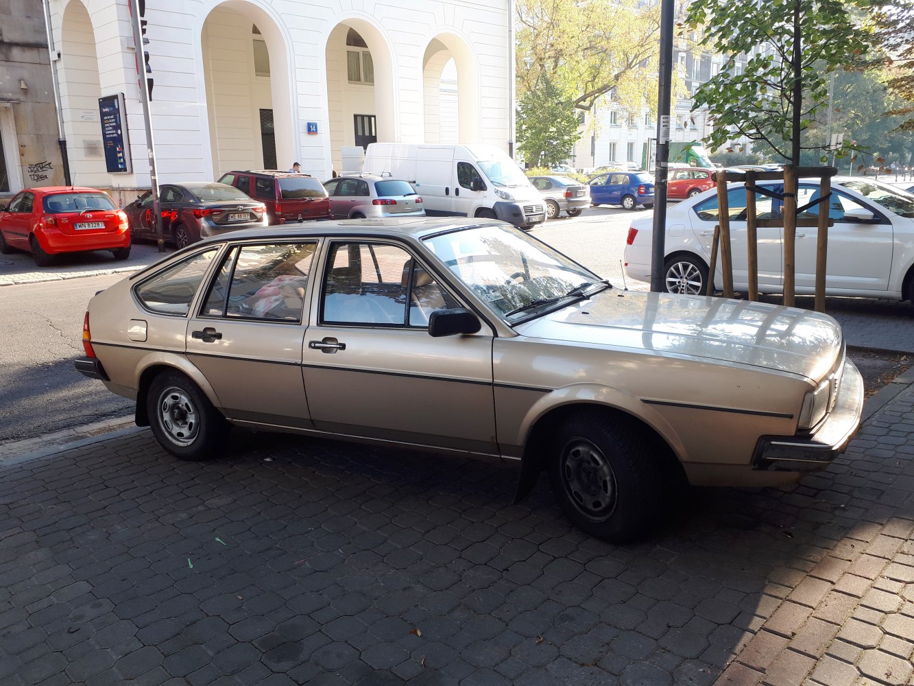 Classic 1980s hatchback side view with sharp body lines and distinct window design