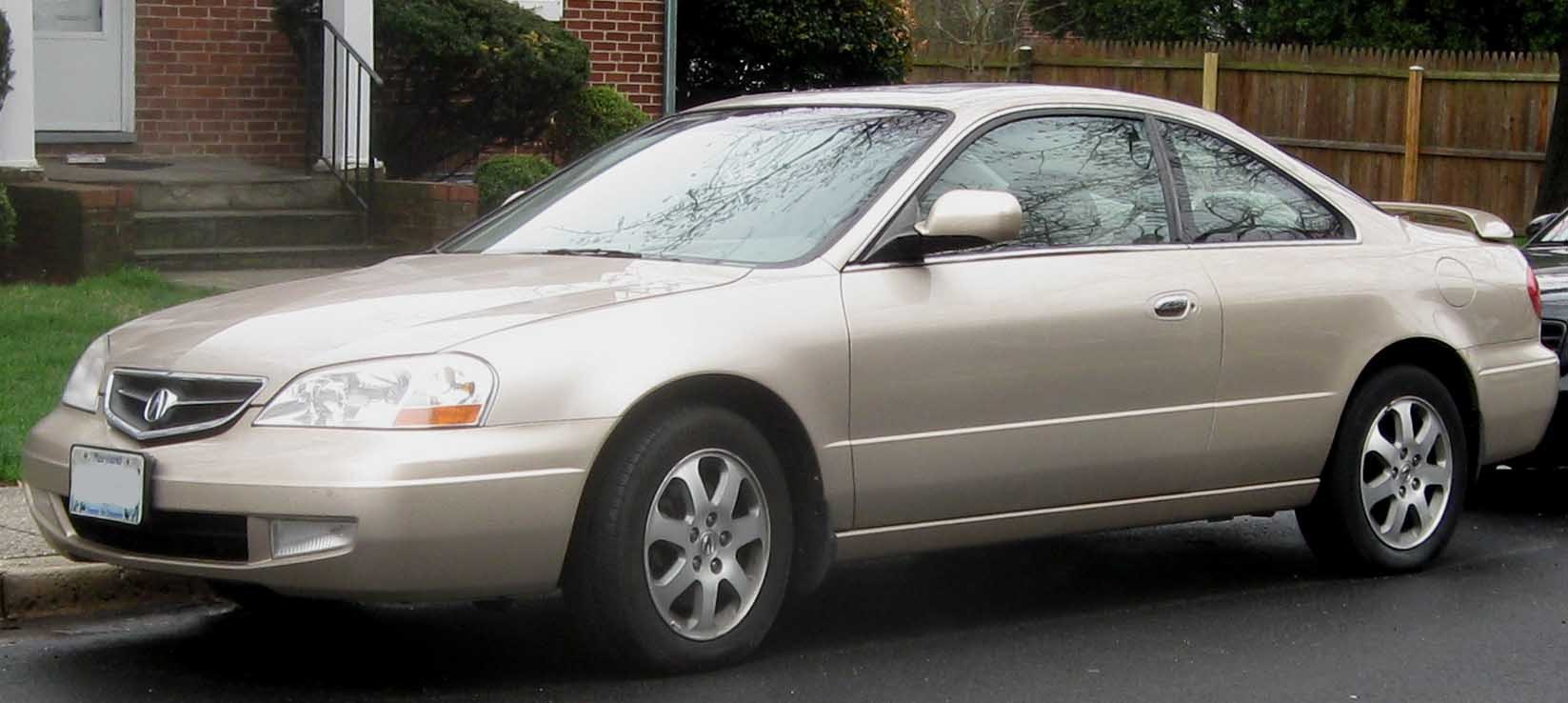 Two-door coupe with rear spoiler and alloy wheels