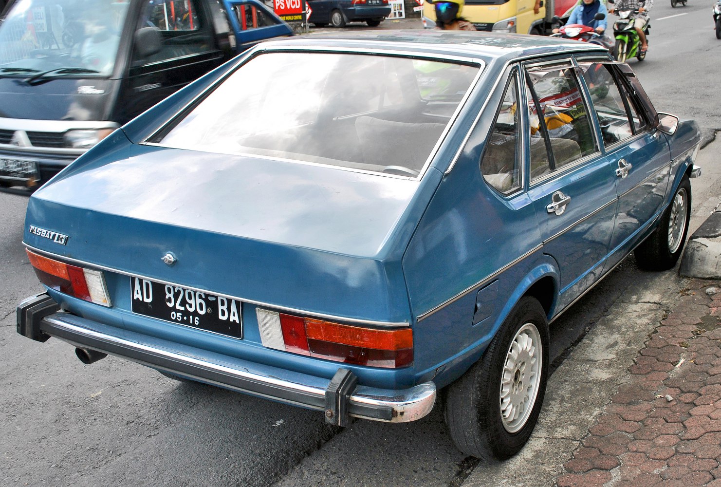 Rear-angle view of vintage hatchback with angular design and classic tail lights