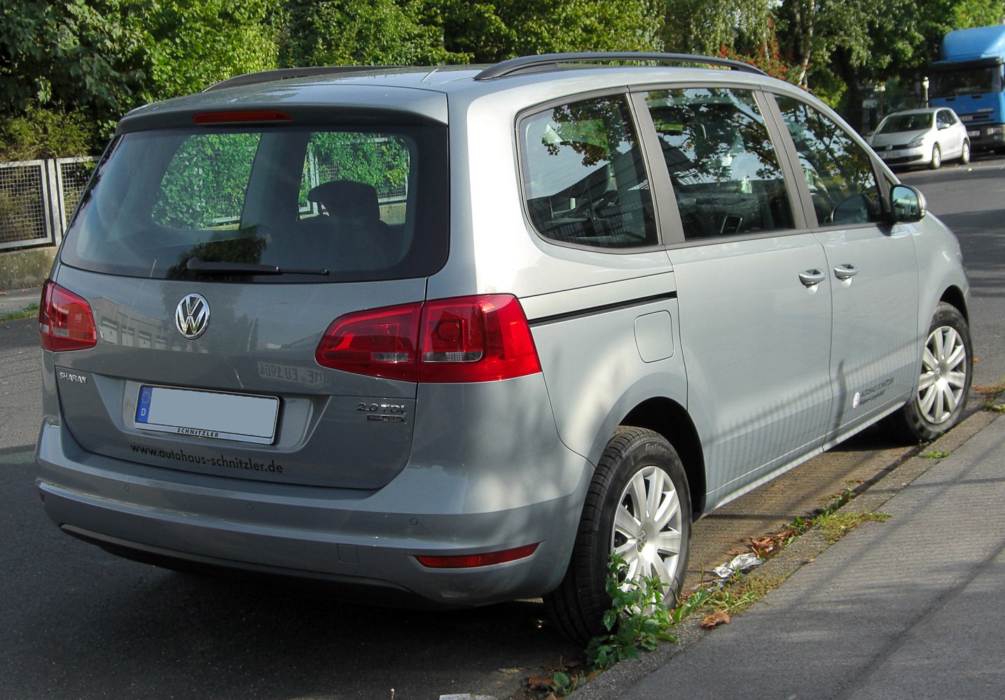 Rear view of MPV with distinctive tail lights and large rear window