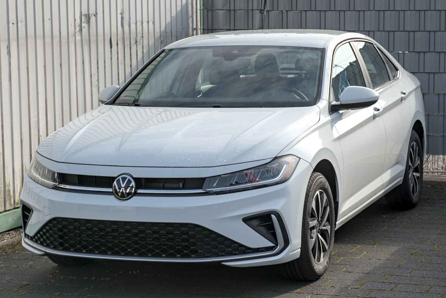 Front view with LED headlights and modern grille