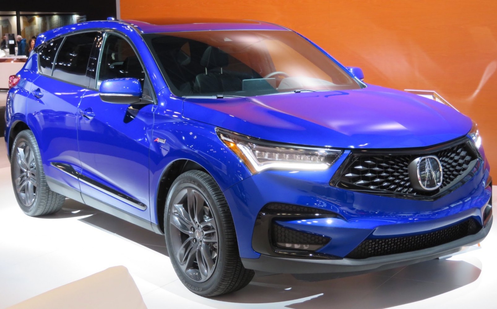 LED headlights and black grille on SUV front view