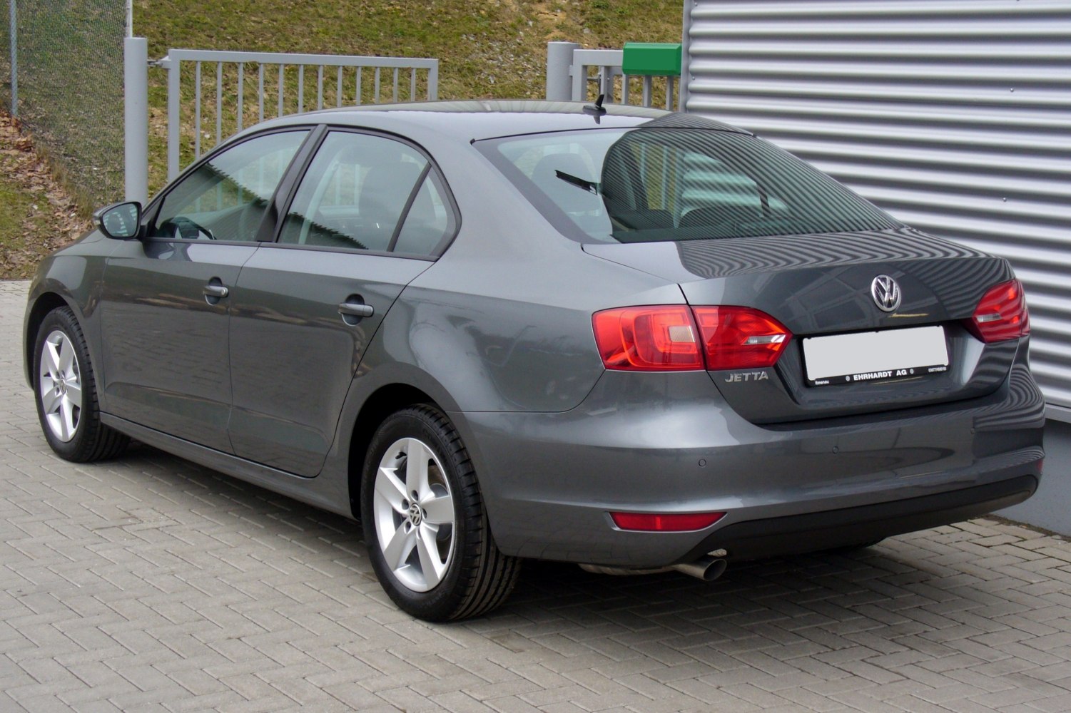 Rear-side view with alloy wheels and modern taillights