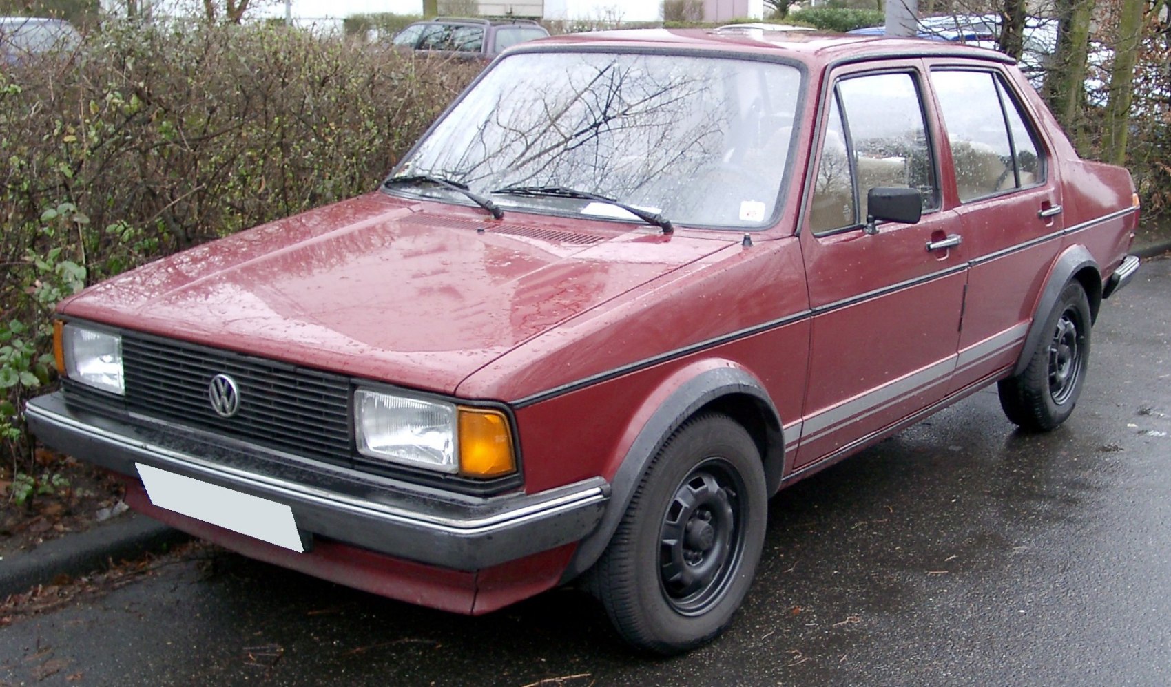 Vintage sedan with rectangular headlights and black steel wheels