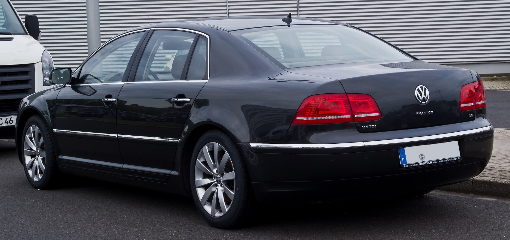 Rear and side view with taillights and alloy wheels