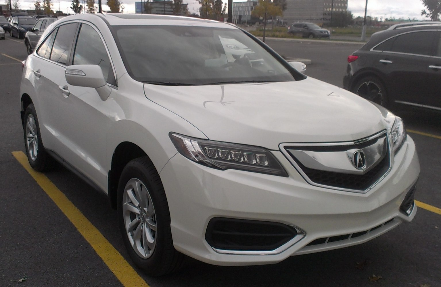 Front three-quarter view of an SUV with LED headlights and distinctive grille