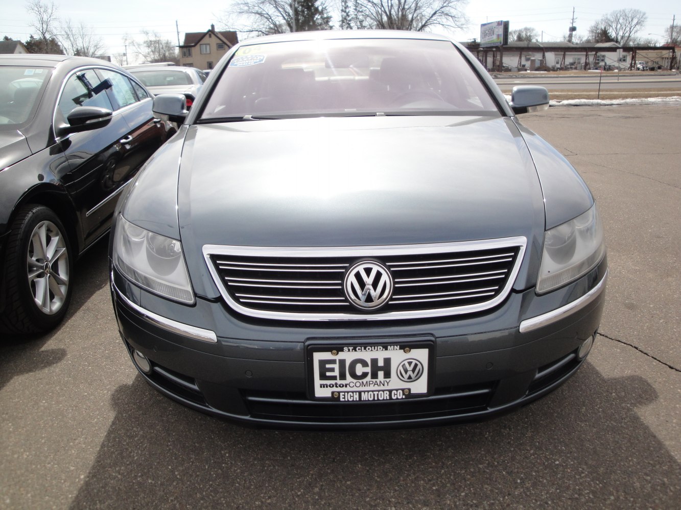 Front grille and headlights close-up of luxury sedan