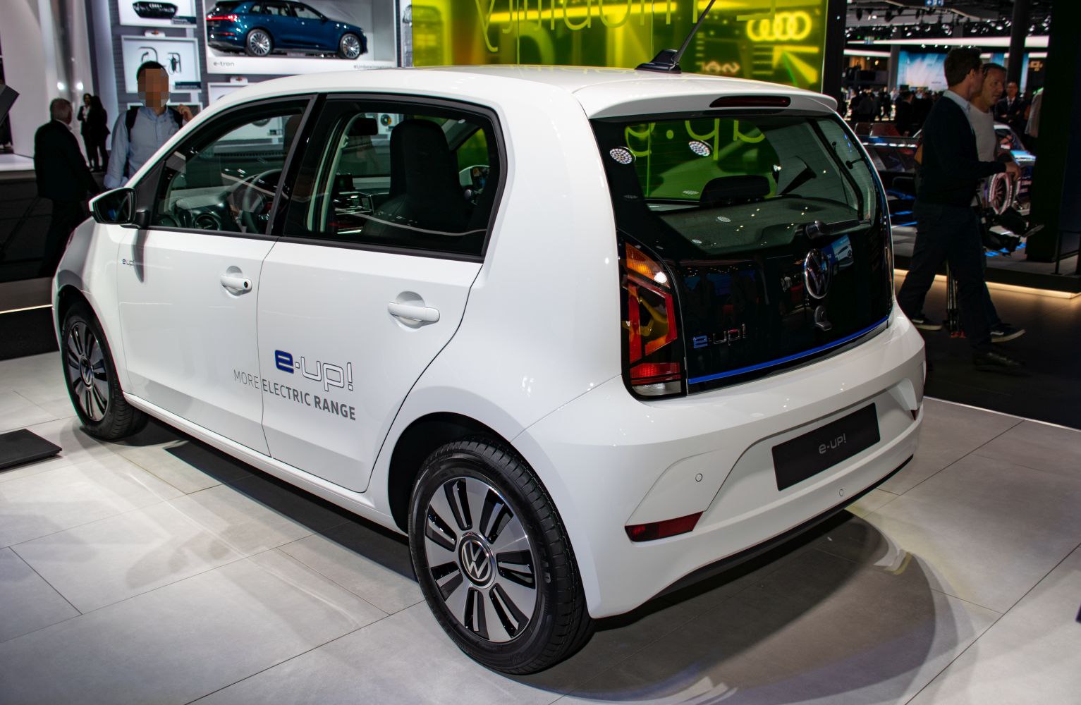 Rear side view of electric hatchback with distinctive taillights and e-up! badge