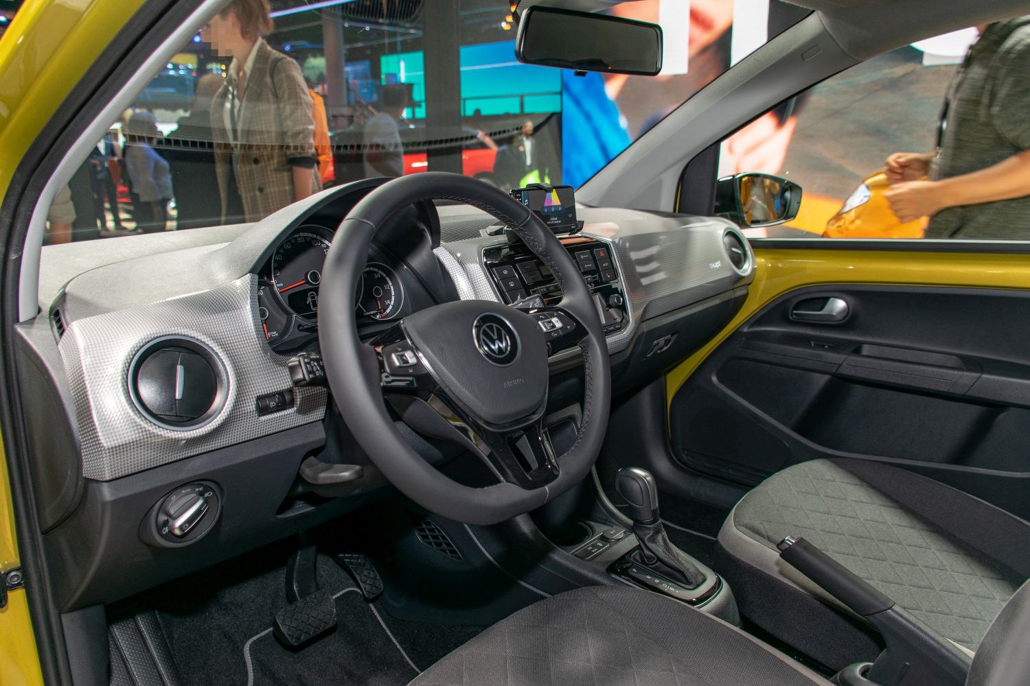 Dashboard and steering wheel with automatic transmission in compact car interior