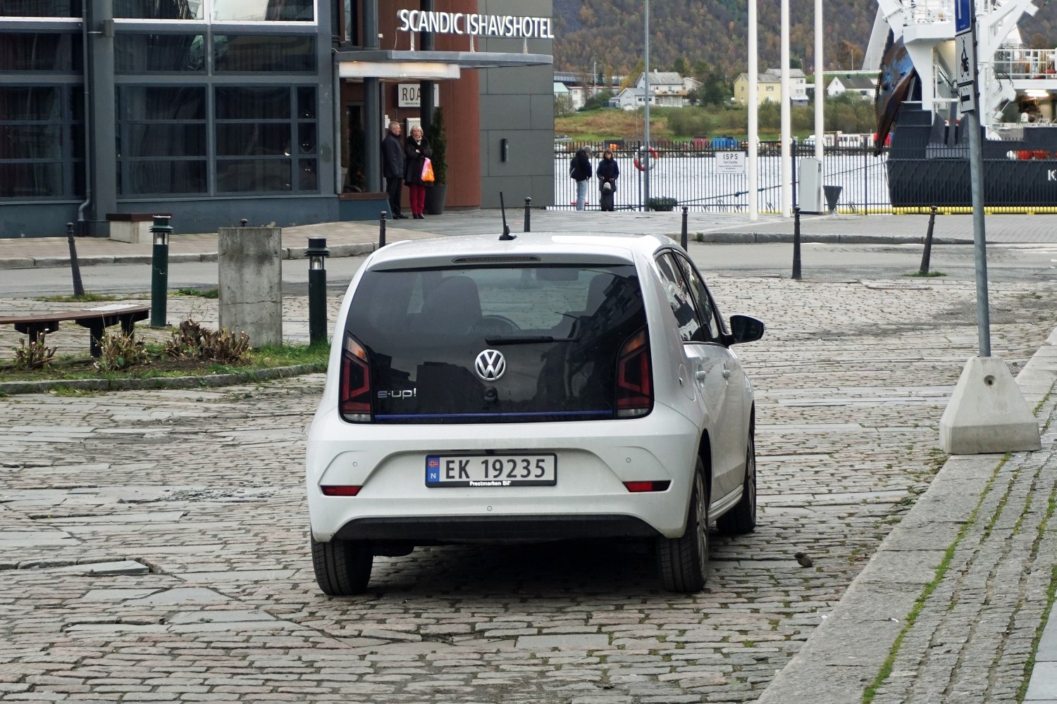 Rear view of an electric hatchback with distinctive taillights and compact design