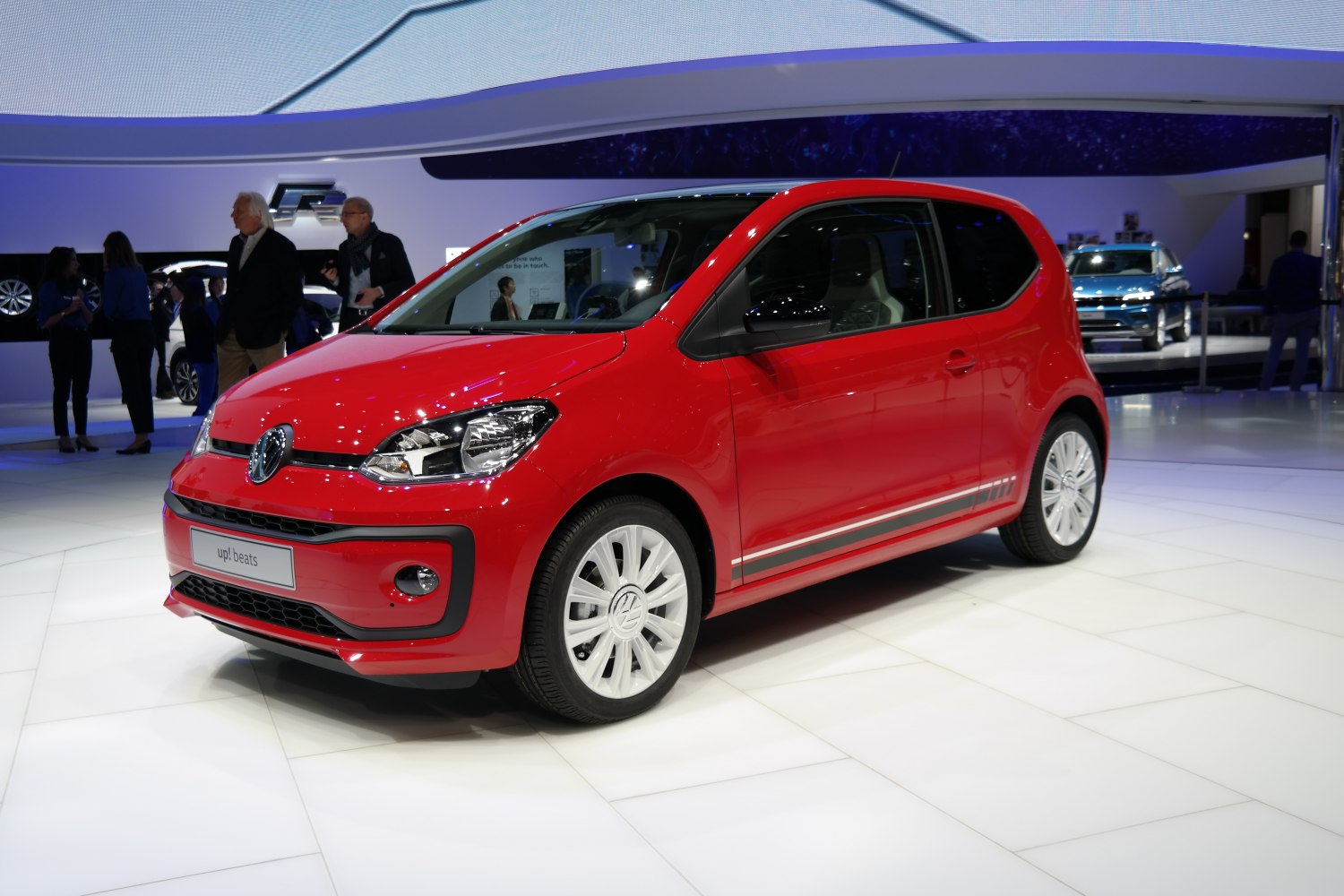 Compact hatchback with modern headlights and sporty side decals