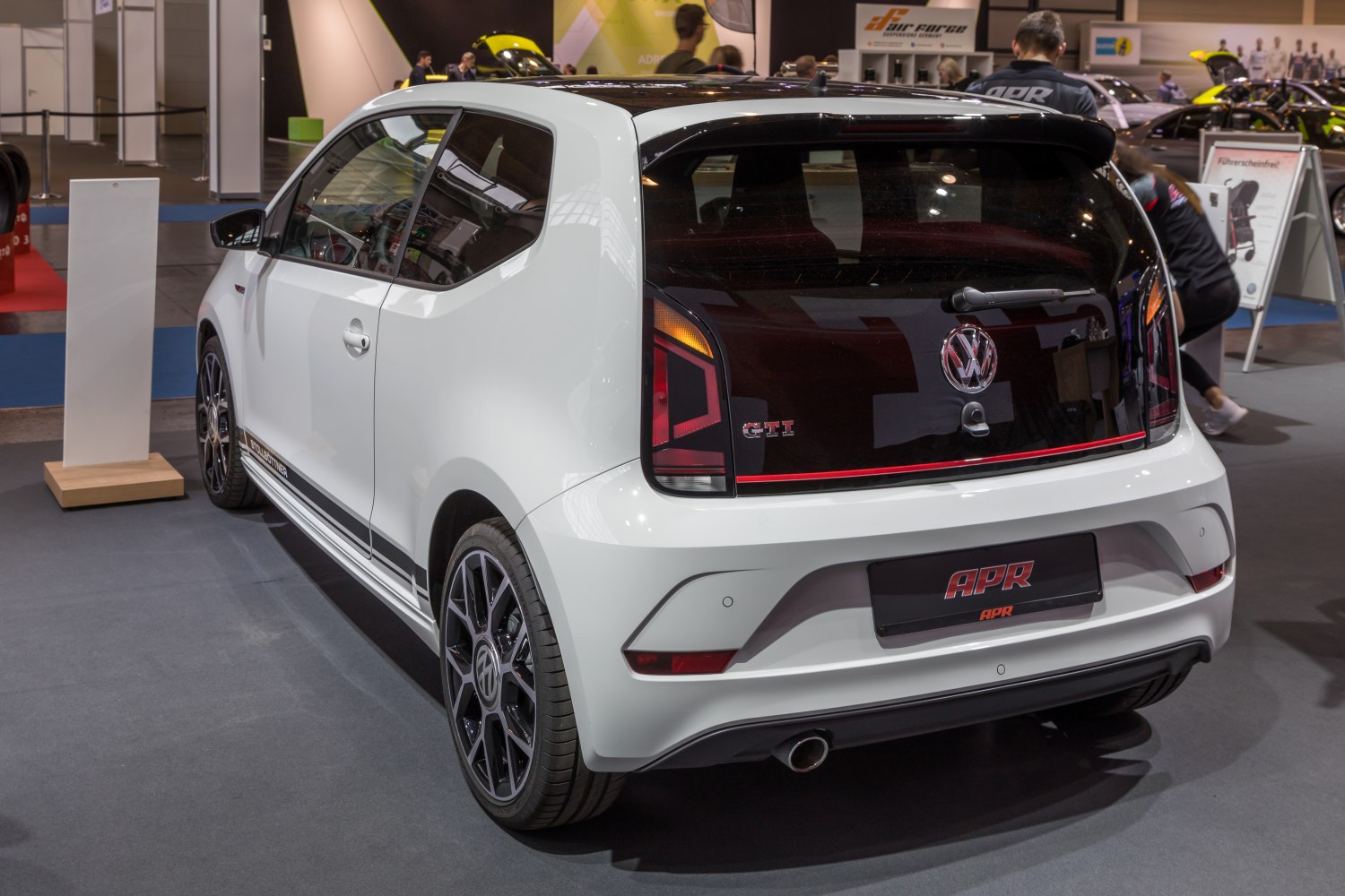 Rear view of compact hatchback with sporty black hatch and distinct taillights
