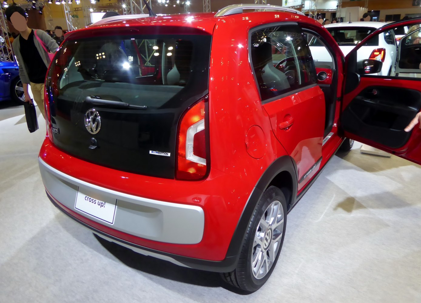Rear-side view with tail light and open rear door