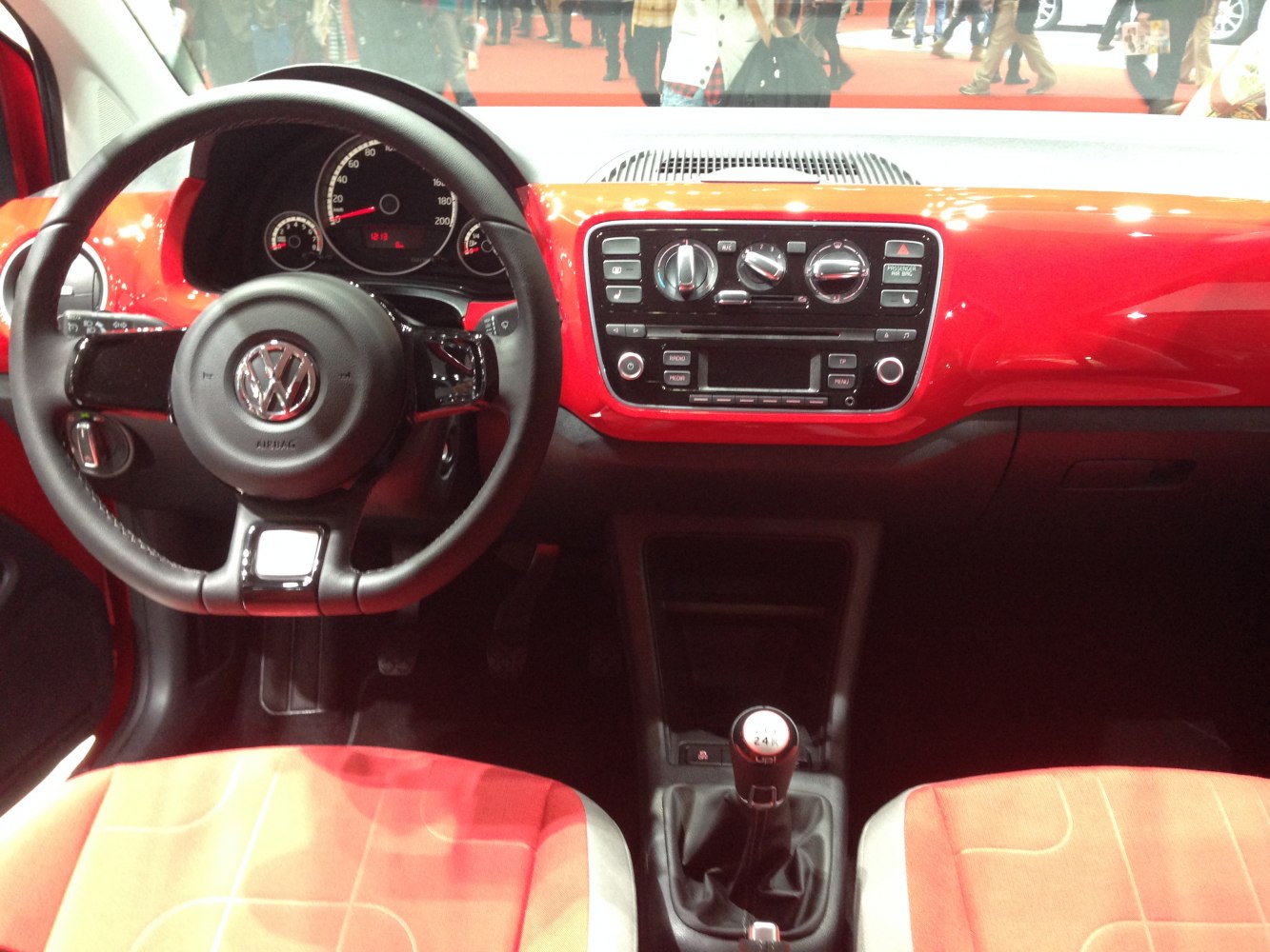 Steering wheel, manual gear shift, dashboard controls