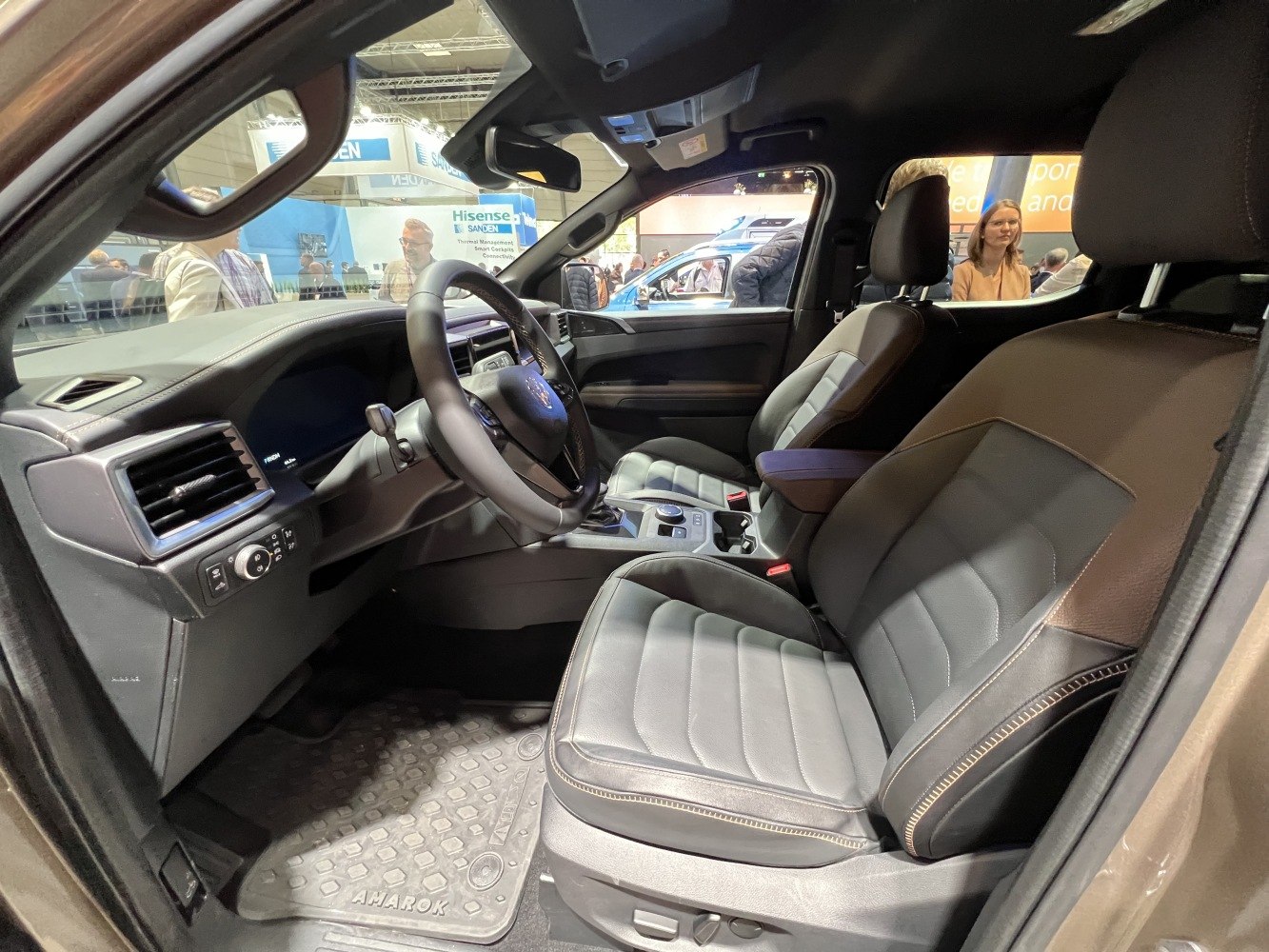 Premium leather seats and modern vehicle interior with controls and dashboard