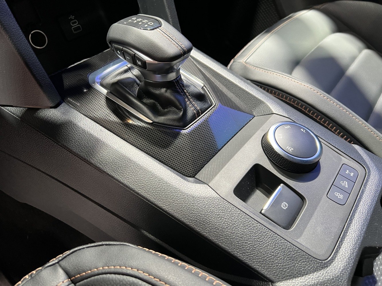 Gear shifter and 4WD drive mode selector in vehicle center console