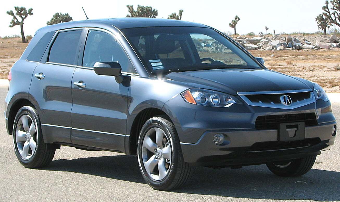 Front side view of SUV with alloy wheels and distinctive headlights