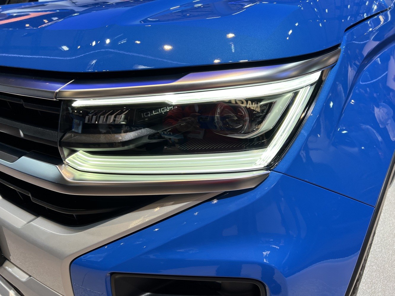 Close-up of front LED headlight with sleek modern design