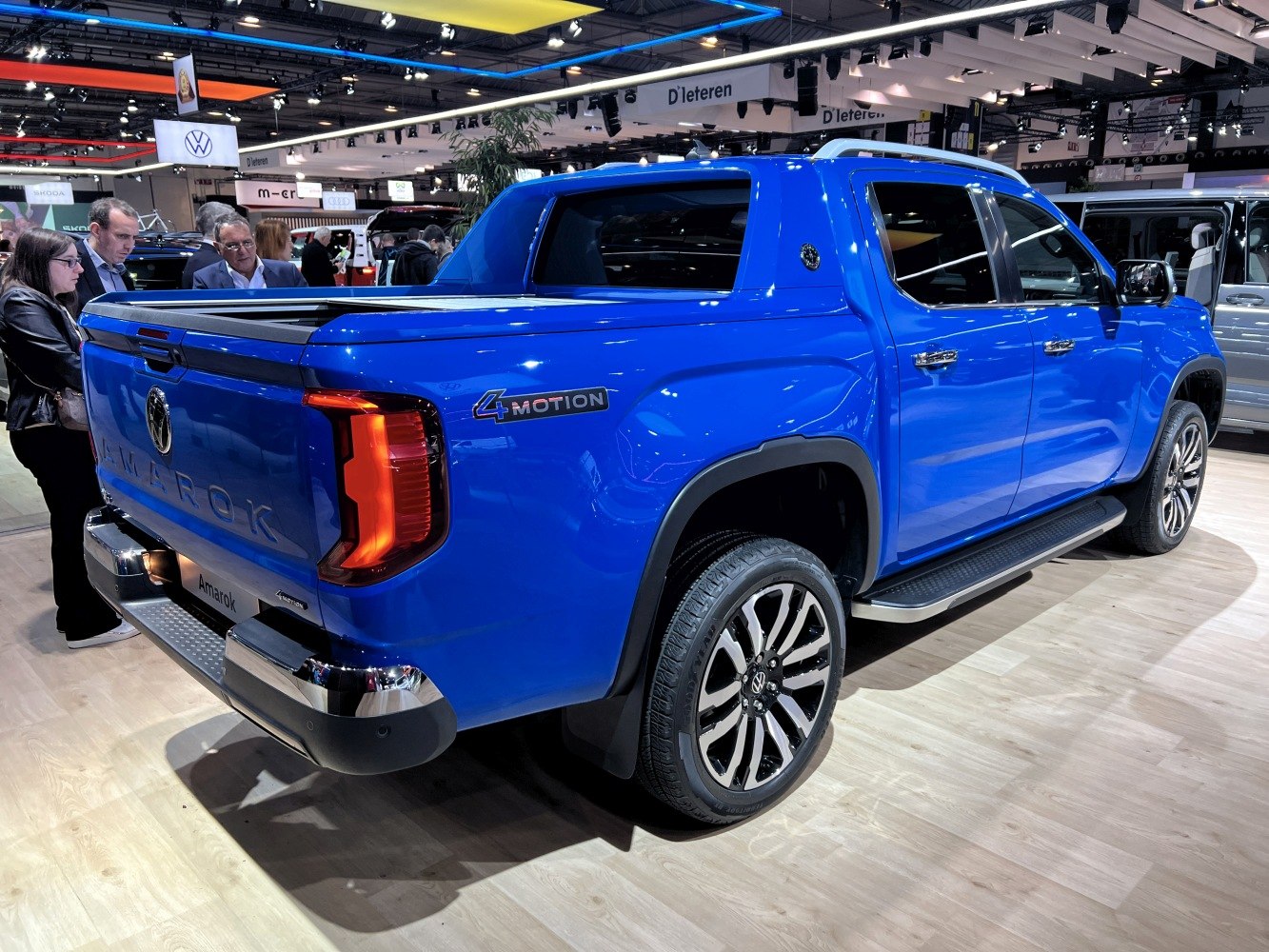 Blue pickup rear tailgate with 4MOTION badge and alloy wheels