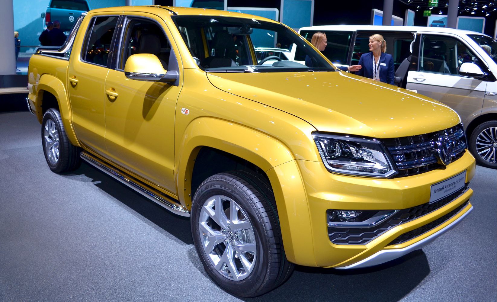 Double cab pickup front-side view with LED headlights and alloy wheels