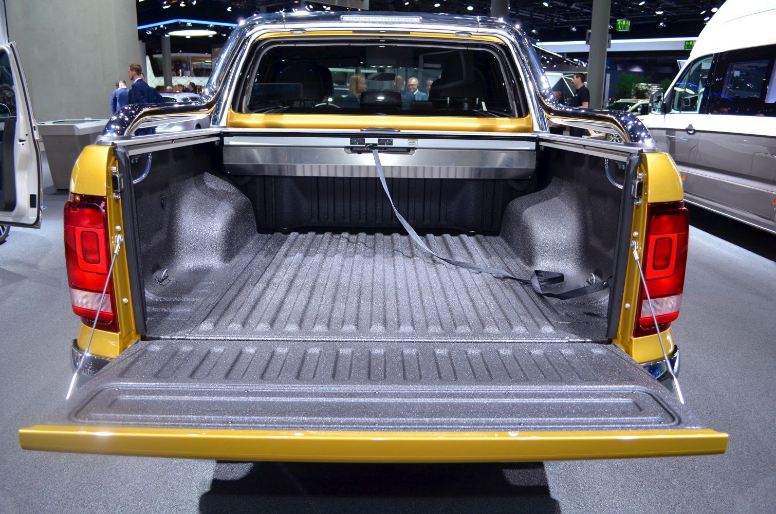 Open pickup bed with protective liner and open tailgate