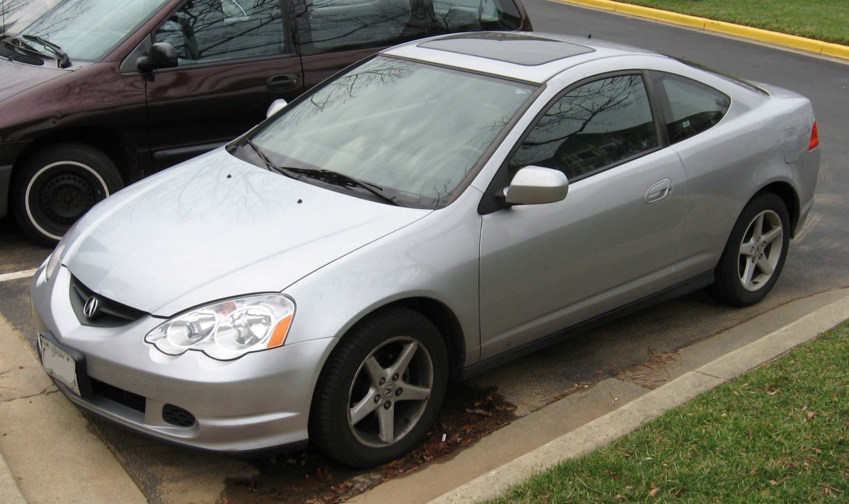 Silver compact coupe with sunroof and alloy wheels