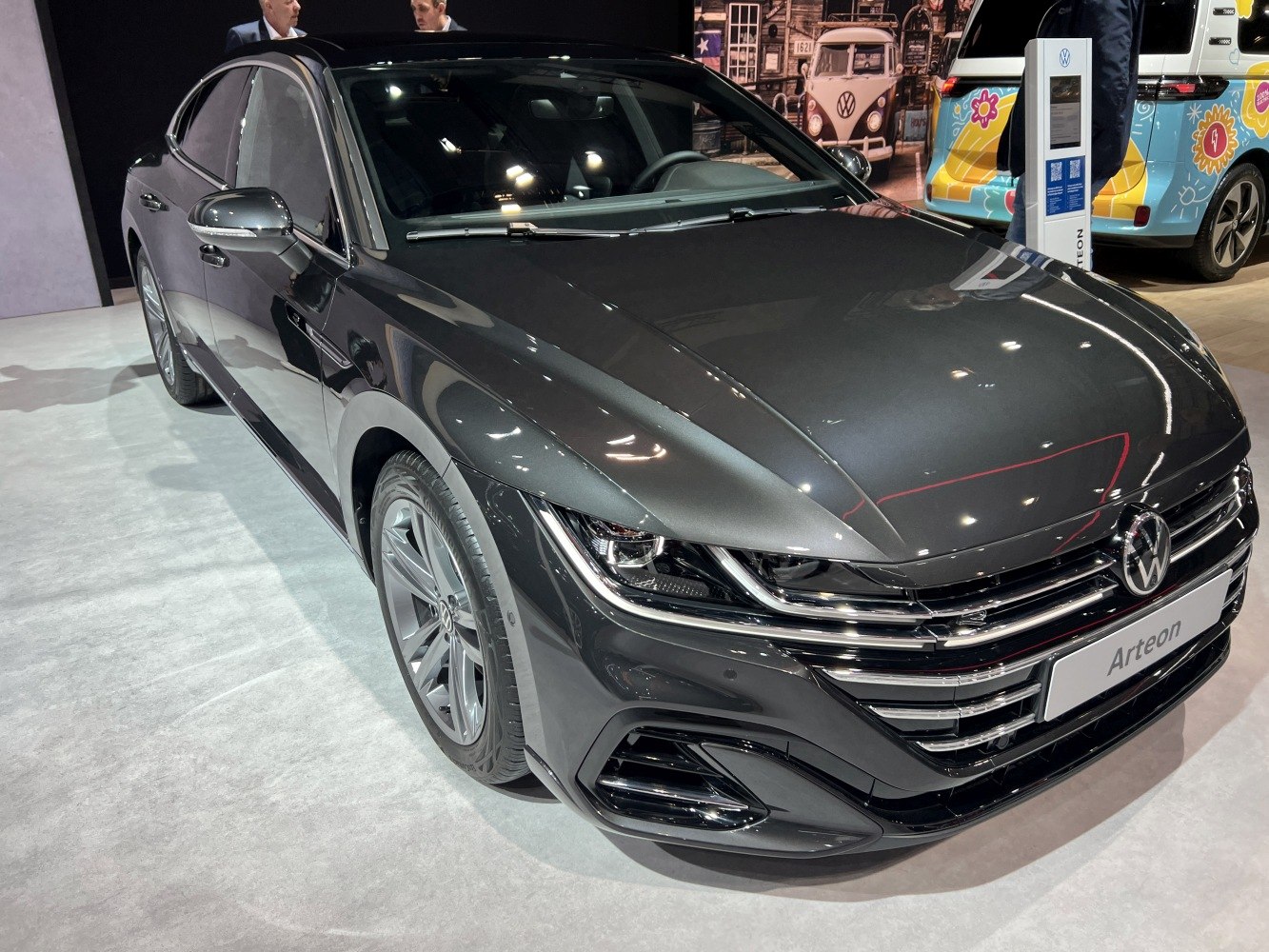 Sleek black executive sedan with LED headlights and aerodynamic front design