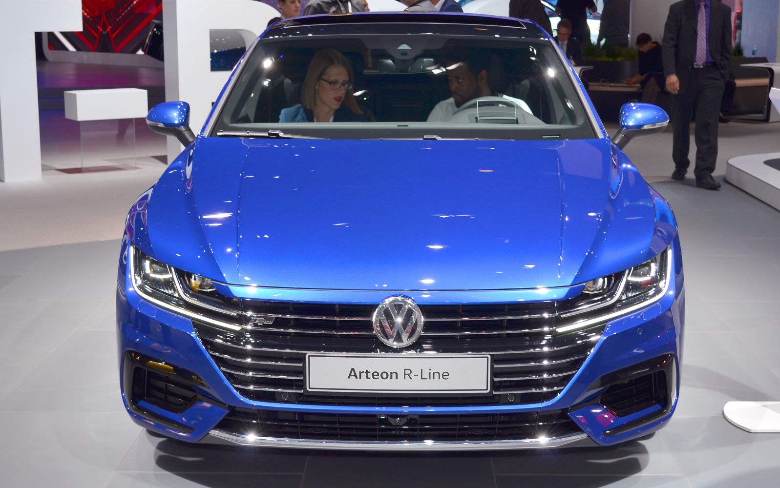 Front view with LED headlights and bold grille design