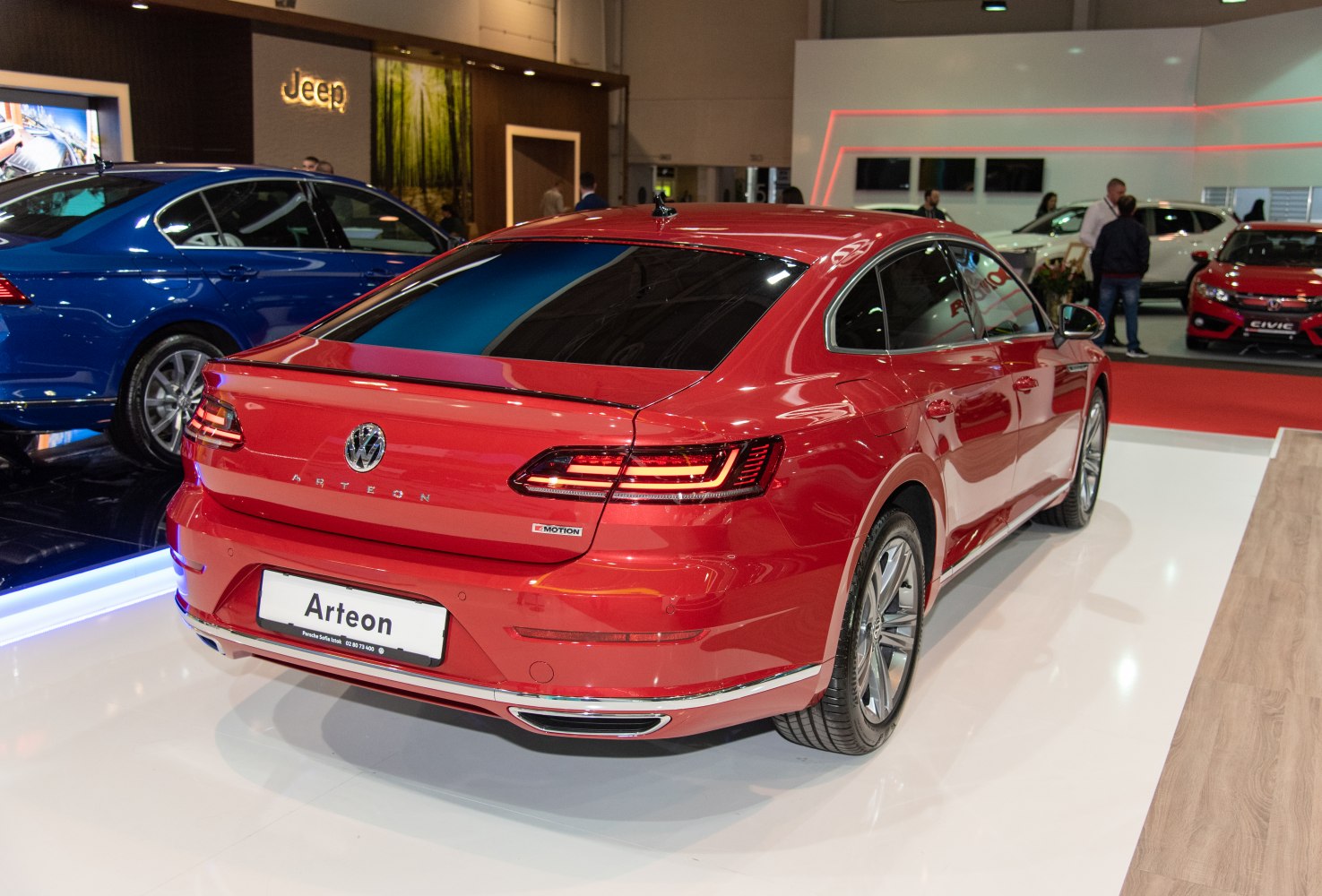 Rear view of a luxury sedan with LED tail lights and modern rear design