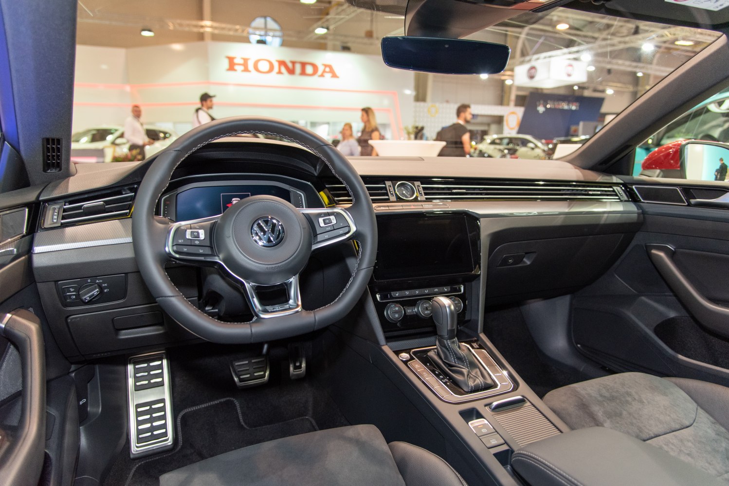 Volkswagen Arteon interior with digital dashboard and multifunction steering wheel.