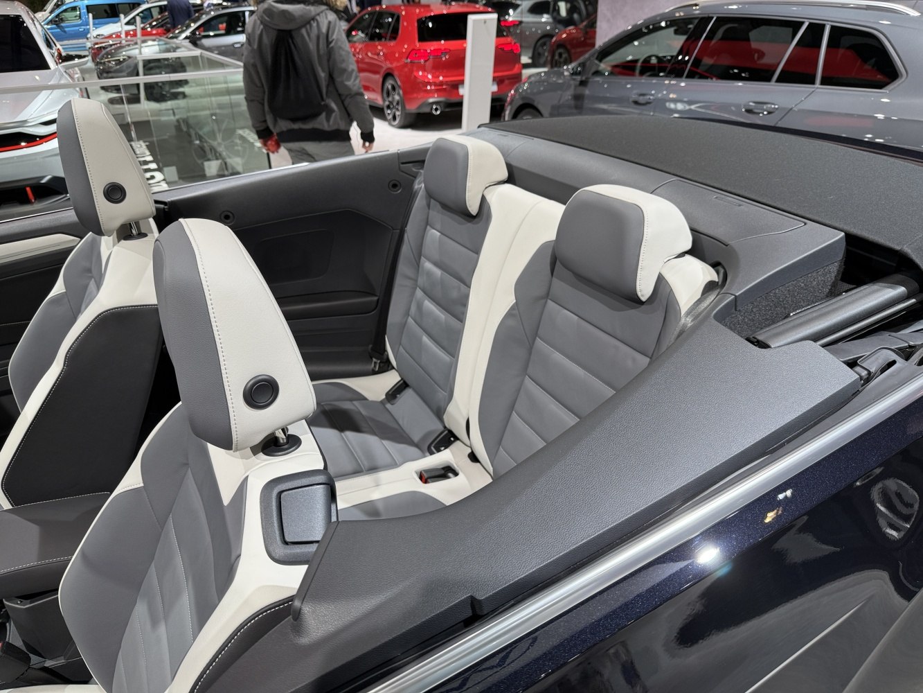 Two-tone front and rear seats in a convertible interior