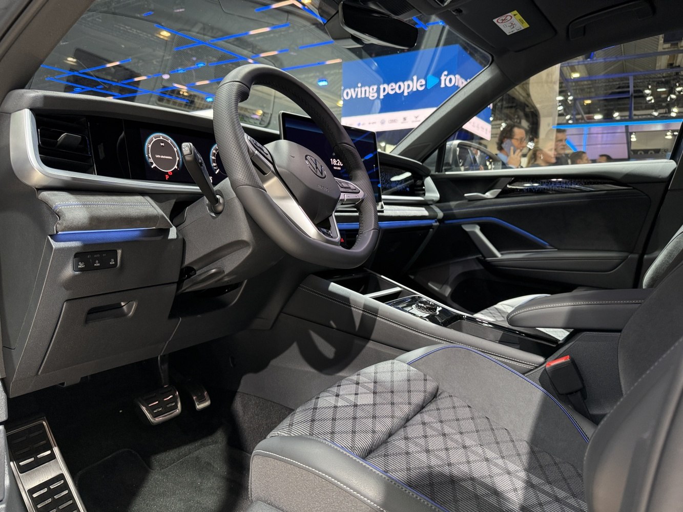 Modern car interior with digital dashboard and steering wheel