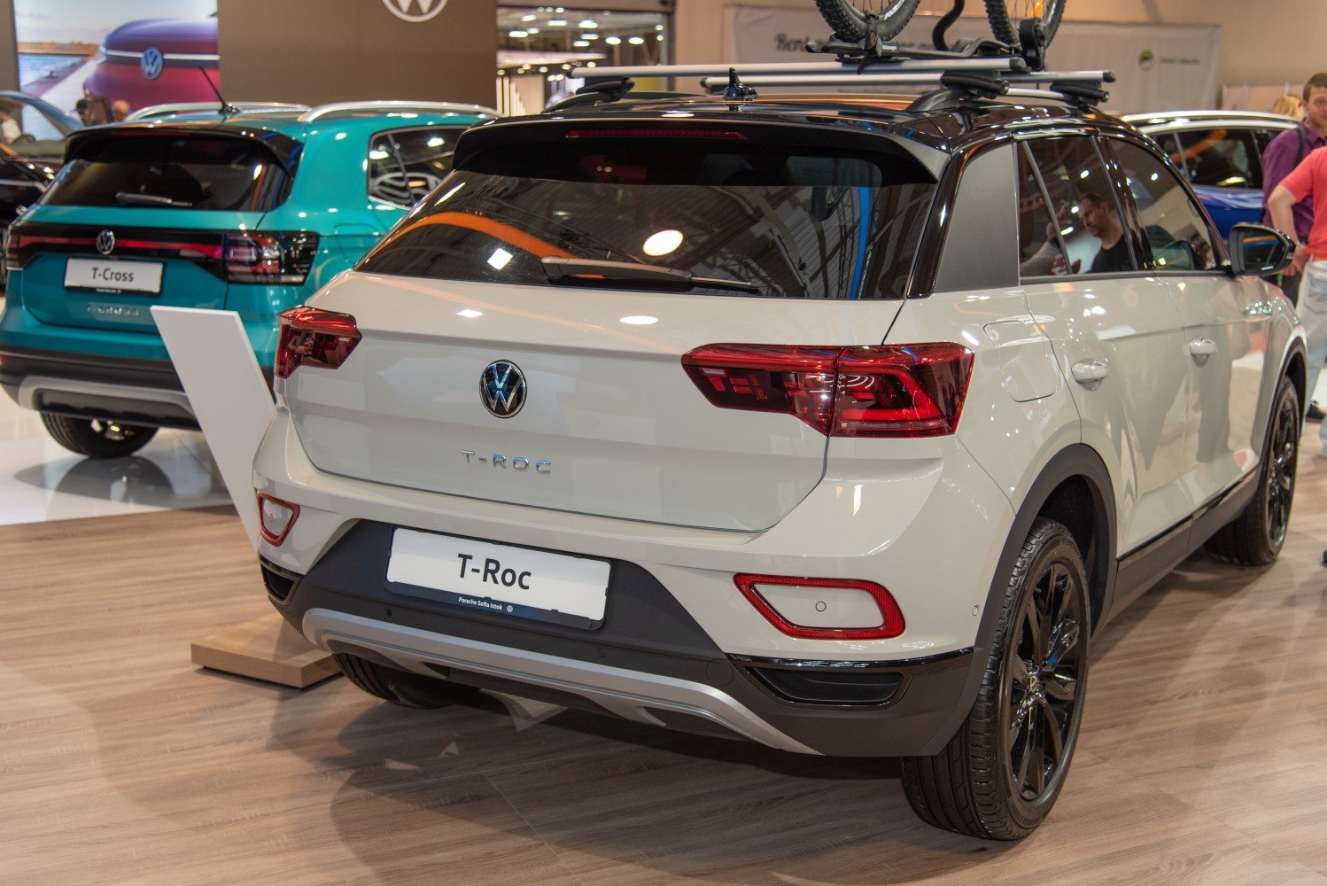 Rear view of compact SUV with LED tail lights and roof bike rack