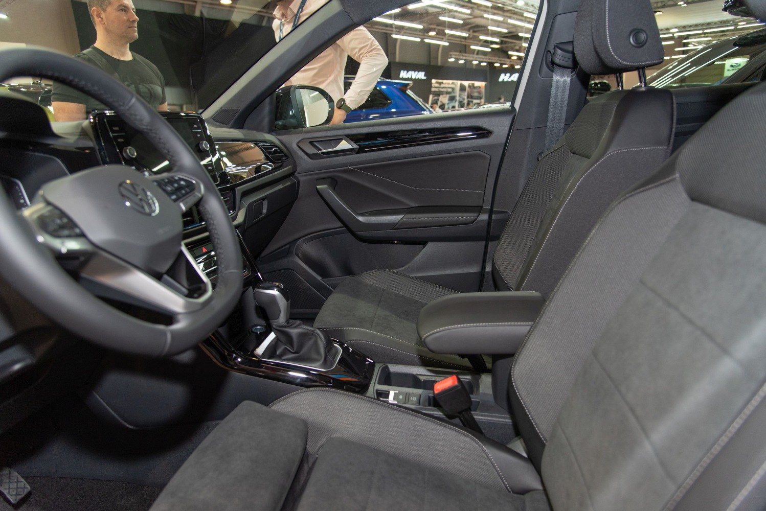 Modern car interior with dashboard, upholstery, and gear shift