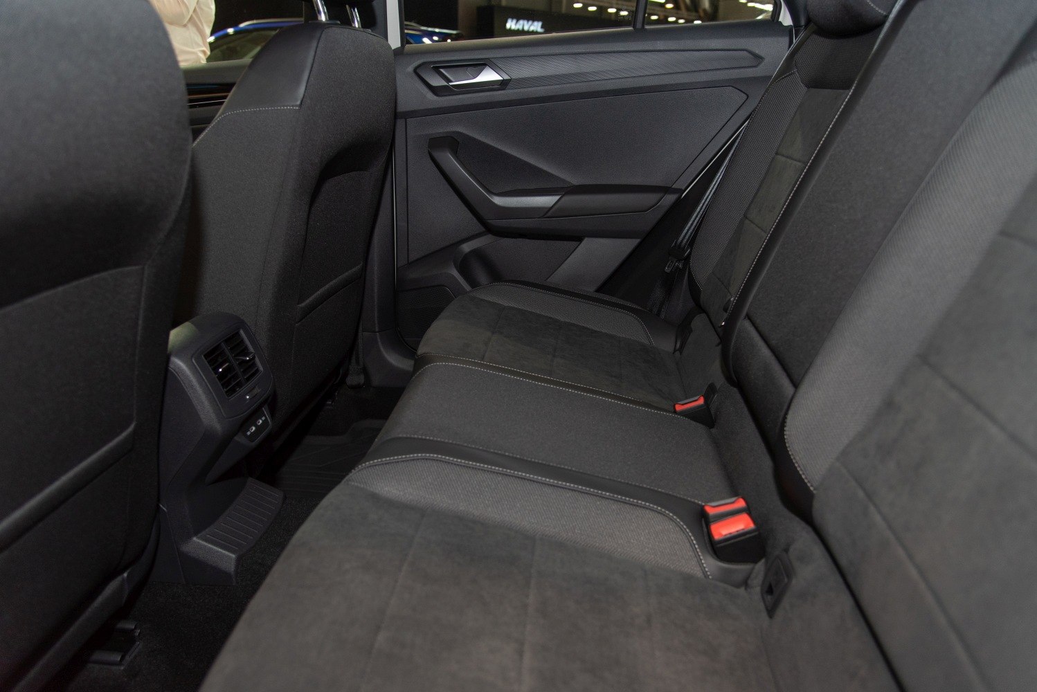 Rear seat interior with modern fabric upholstery and rear air vents