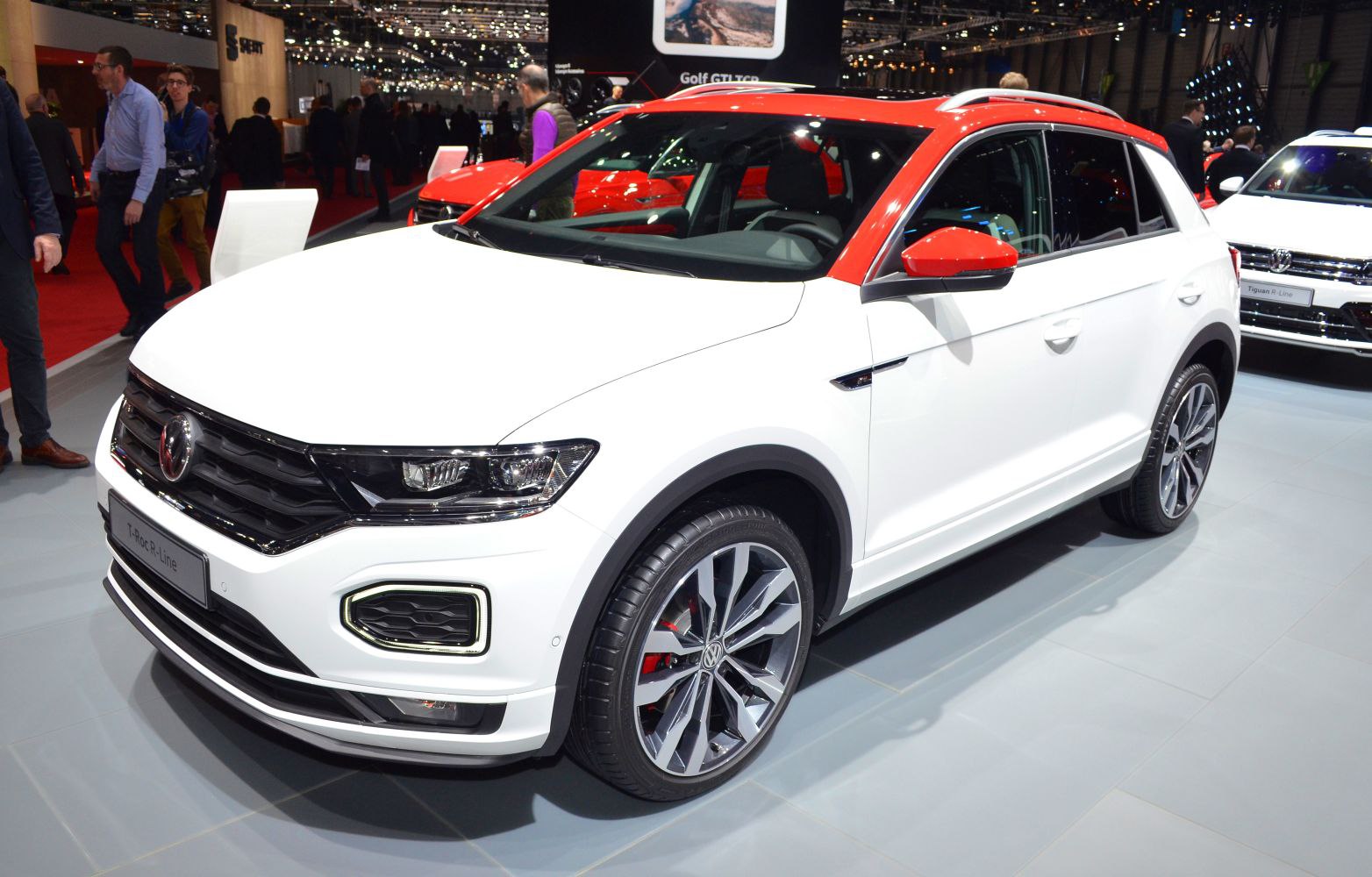 Compact SUV with red two-tone roof and LED headlights