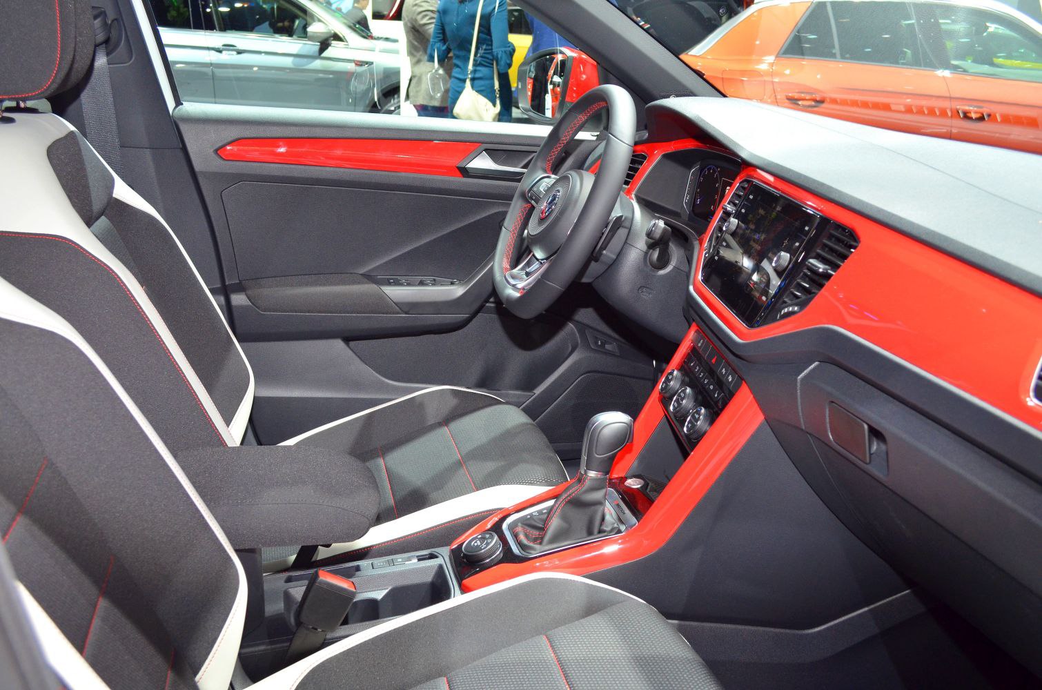 Red dashboard trim and detailed fabric seats with red stitching