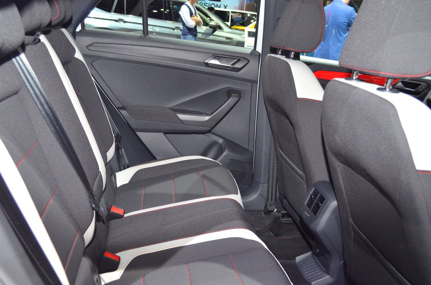 Rear interior seating with fabric seats and door panel