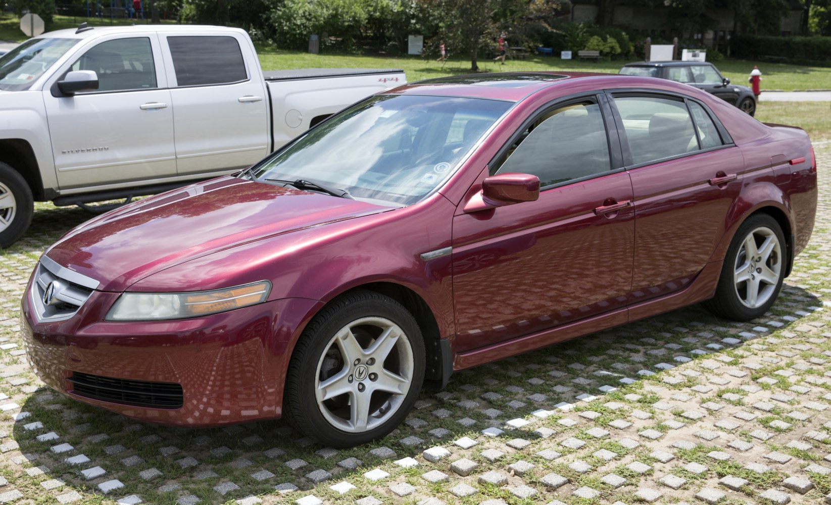 Aerodynamic front end and side profile of sleek four-door sedan