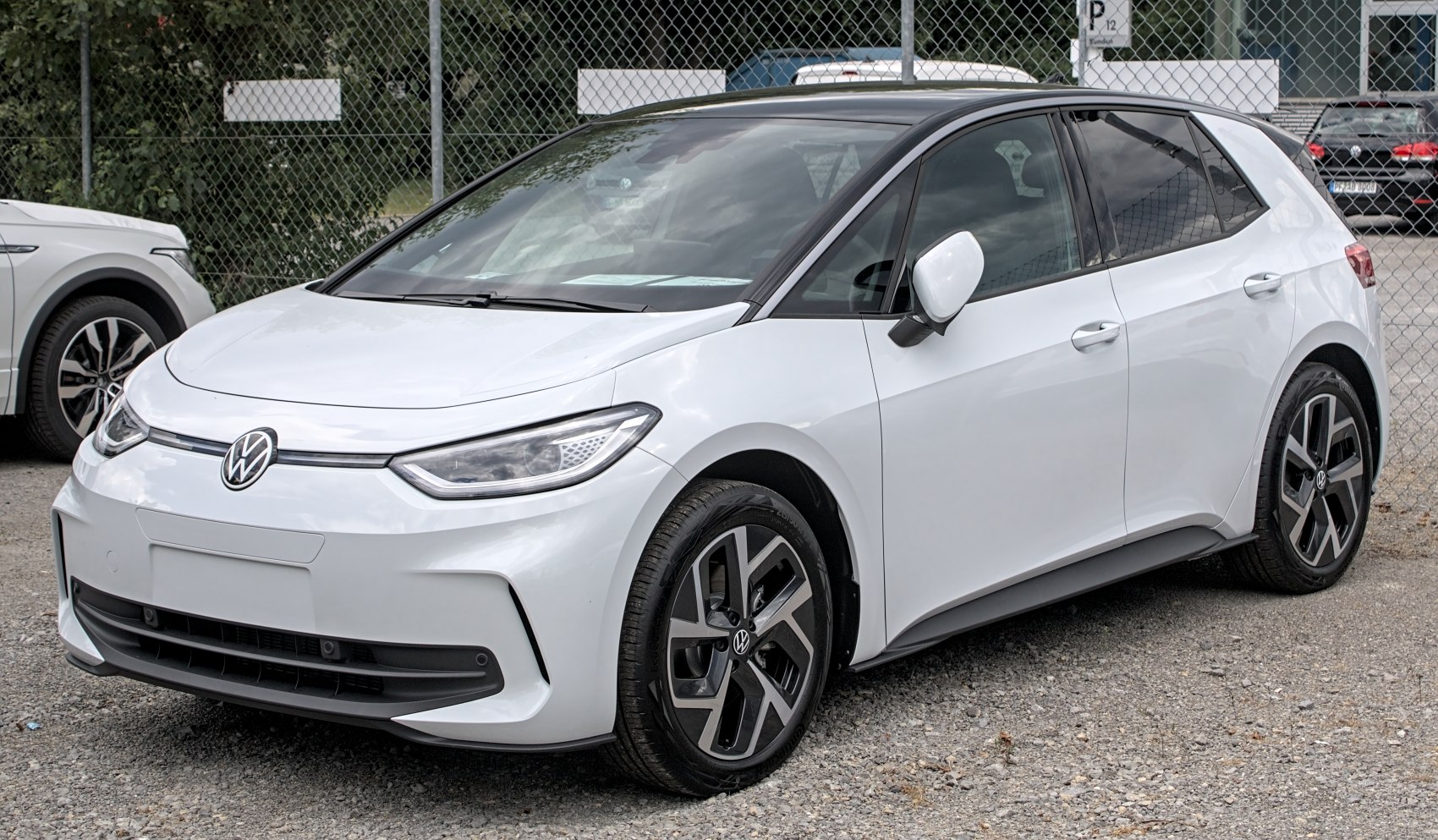 Front-side view of electric hatchback with LED headlights and alloy wheels