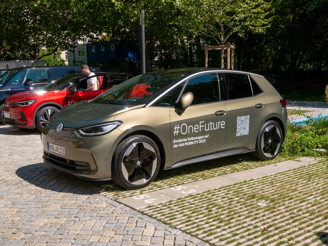 Sleek aerodynamic electric hatchback with distinctive modern wheels