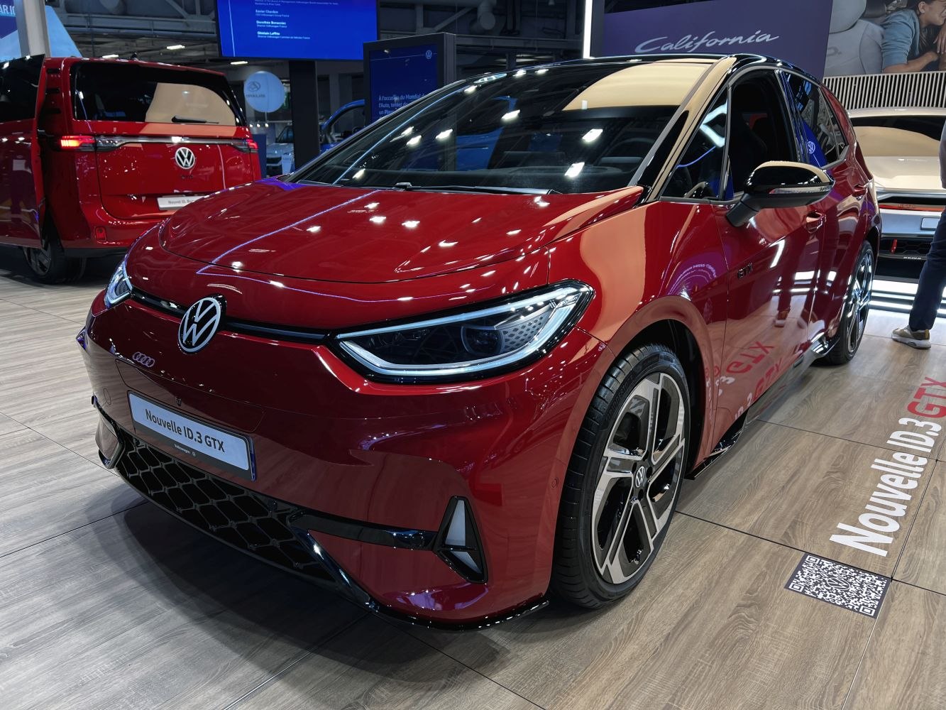 Red VW hatchback with LED headlights and sporty alloy wheels